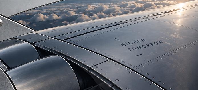Aircraft wing above the clouds from the approved Alpha Leasing card